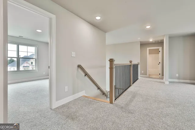 a bathroom with a sink toilet vanity and tub