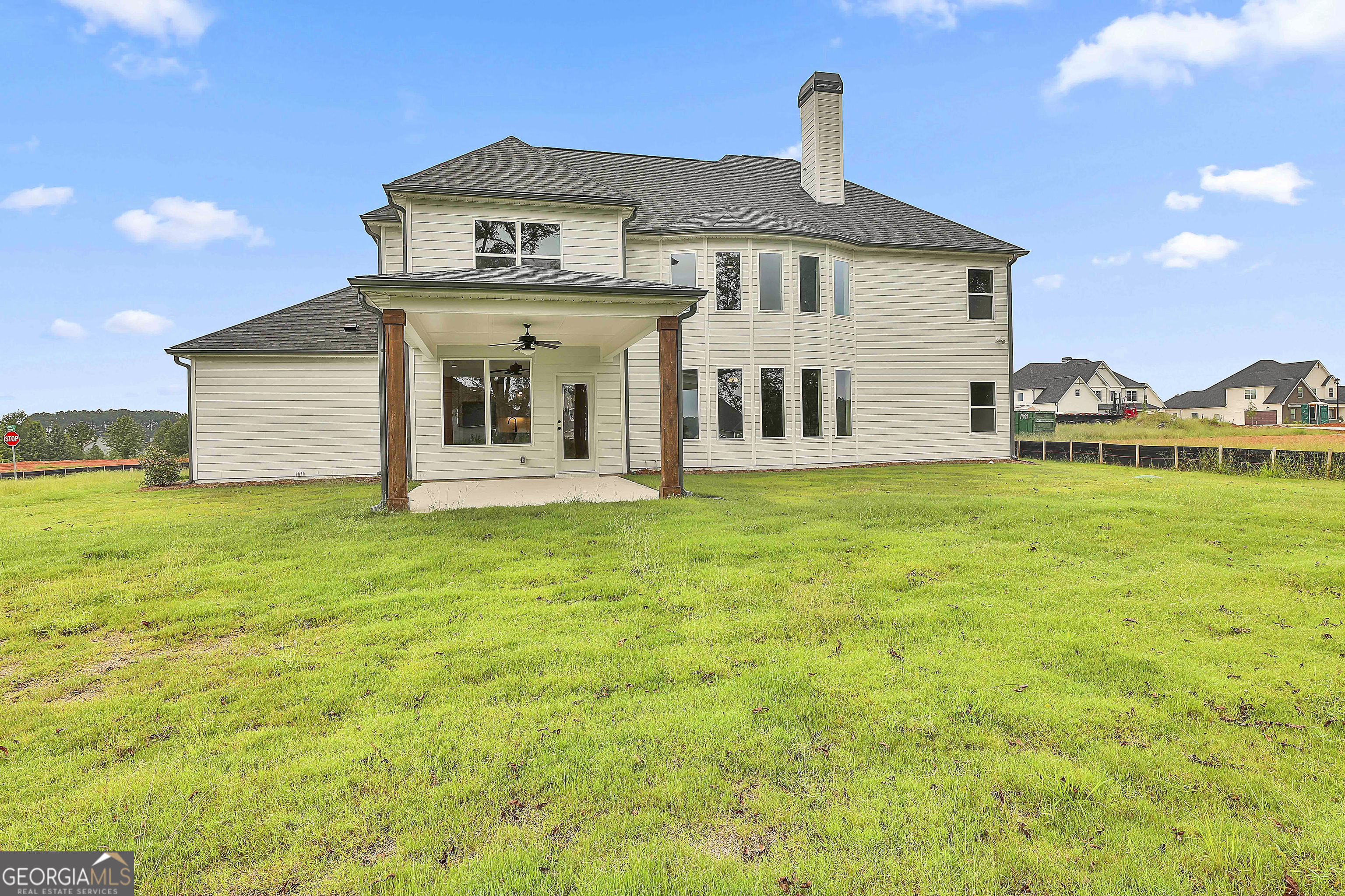 291 Grove Park, Unit 90 Senoia, GA 30276 - Photo 53 of 53 a front view of a house with garden