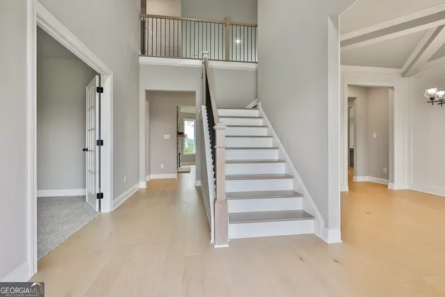 a view of entryway with wooden floor