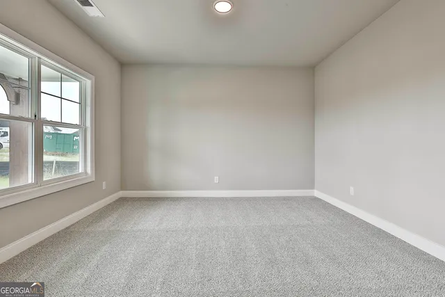 an empty room with a window