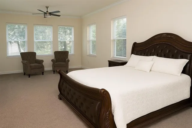 a bathroom with a sink double vanity and a tub