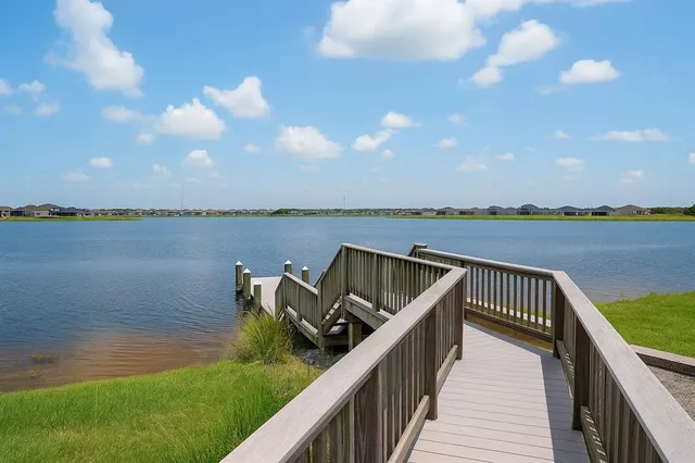 a view of a lake with sitting space and lake view