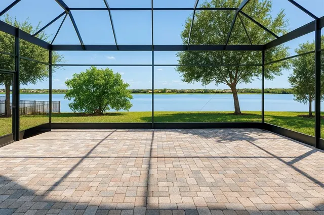 a view of empty room with window and tree