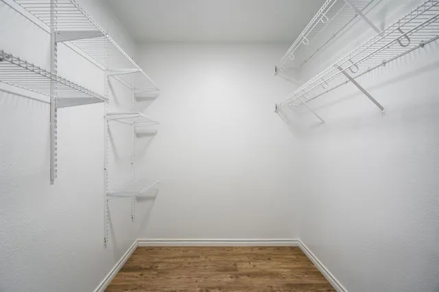 a view of a room with racks on the wall