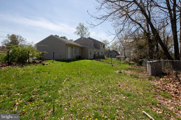 a view of a lake with a yard