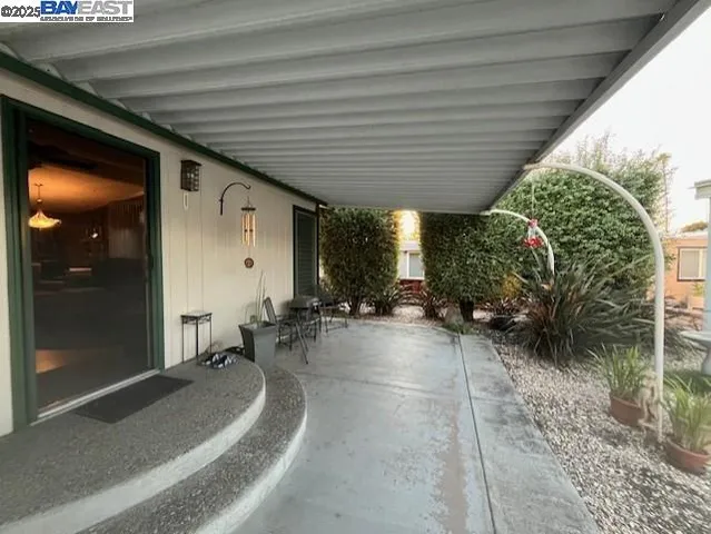 a view of a backyard with pathway