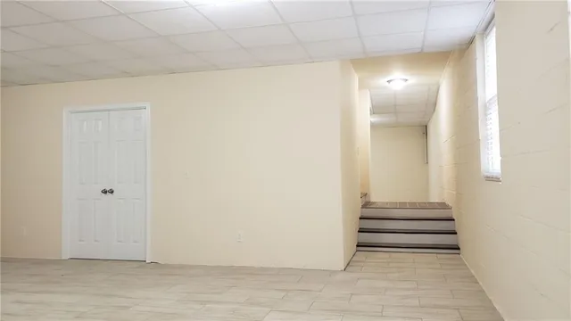 a view of an empty room and window