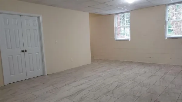 an empty room with windows