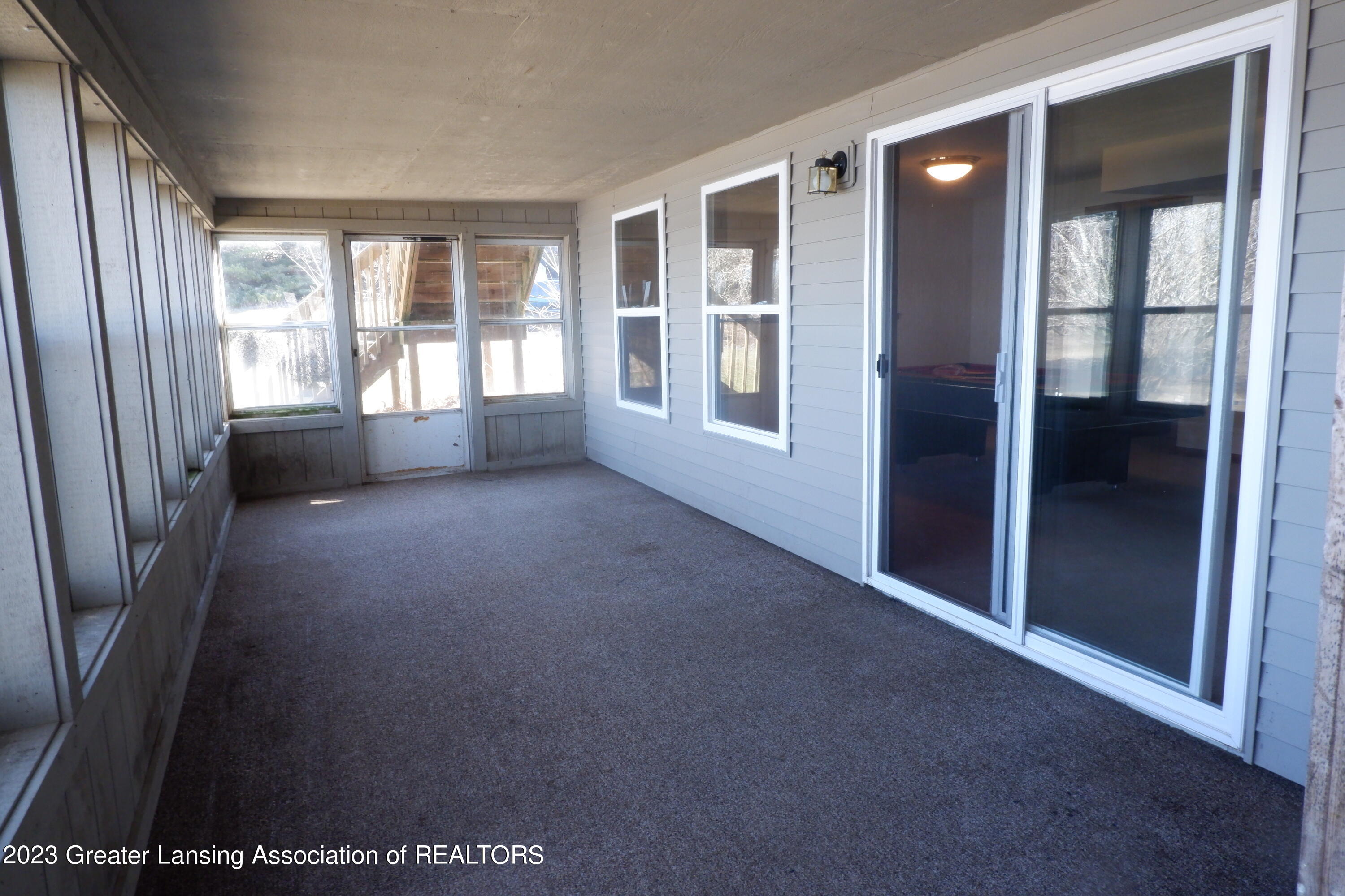 9717 East Jason Road Laingsburg, MI 48848 - Photo 32 of 51 Enclosed porch