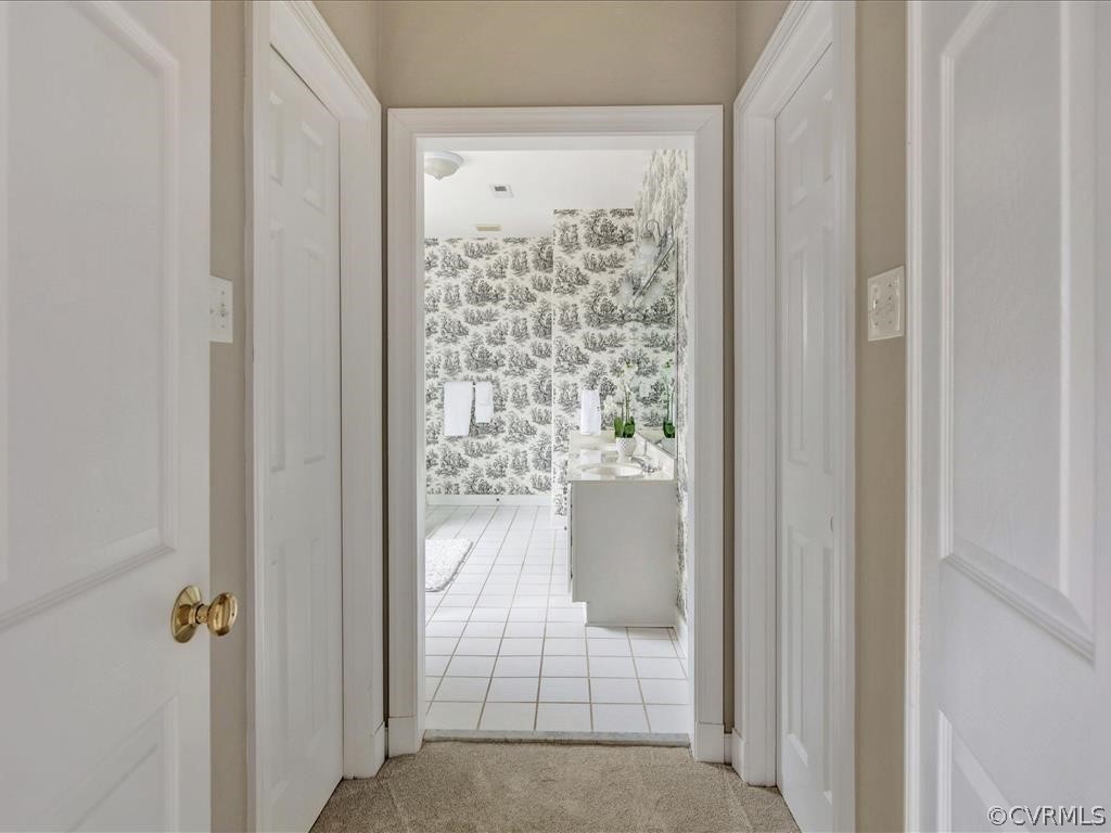 2010 Corner Rock Road Midlothian, VA 23113 - Photo 16 of 27 a bathroom with a glass door shower