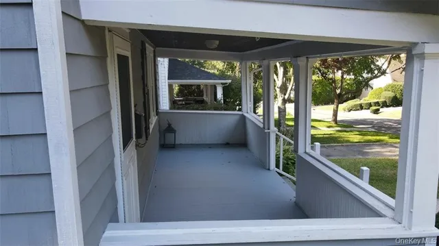a view of a park with large trees