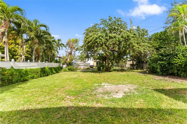 a view of outdoor space yard and swimming pool