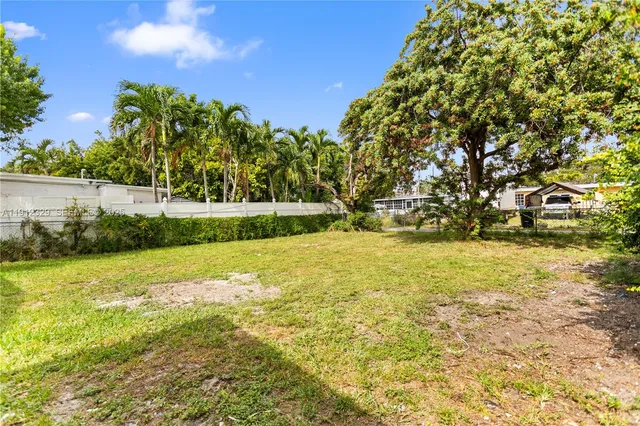 a view of a yard with an outdoor space