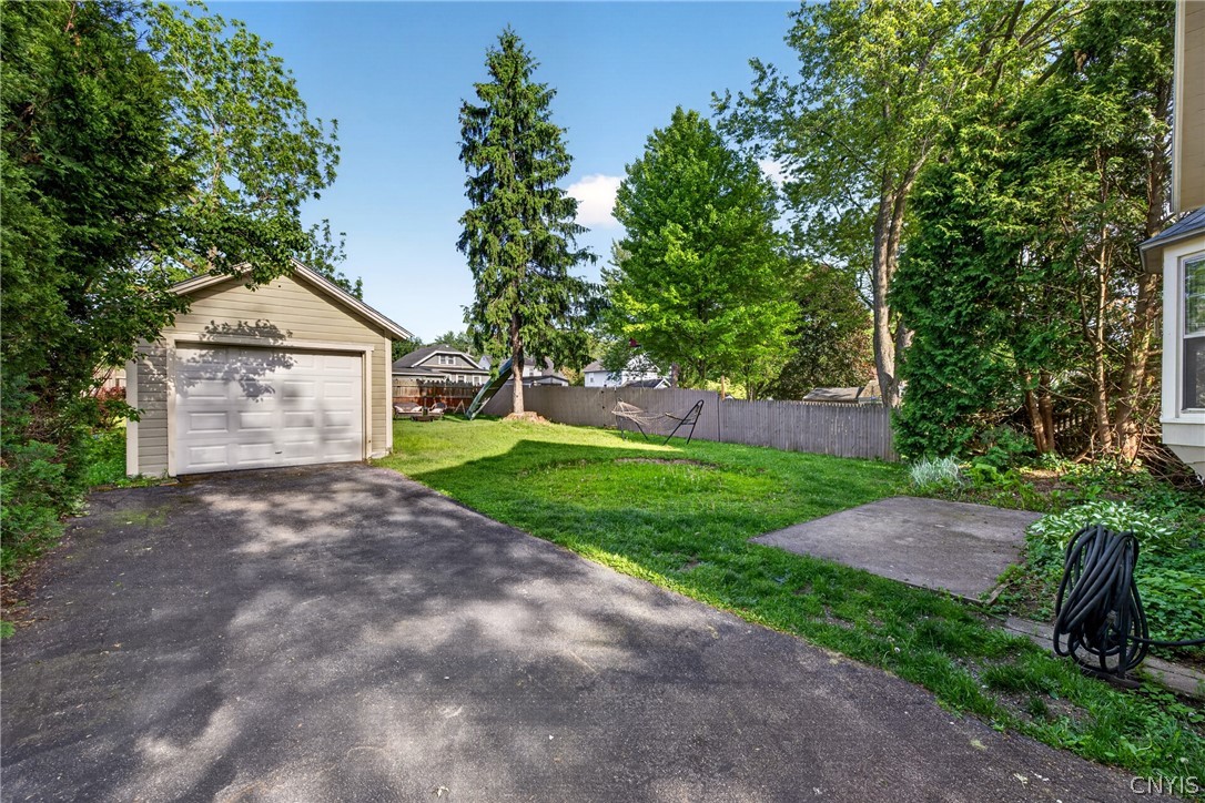 305 Newcastle Road Geddes, NY 13219 - Photo 26 of 29 Another view of the Garage and small Patio