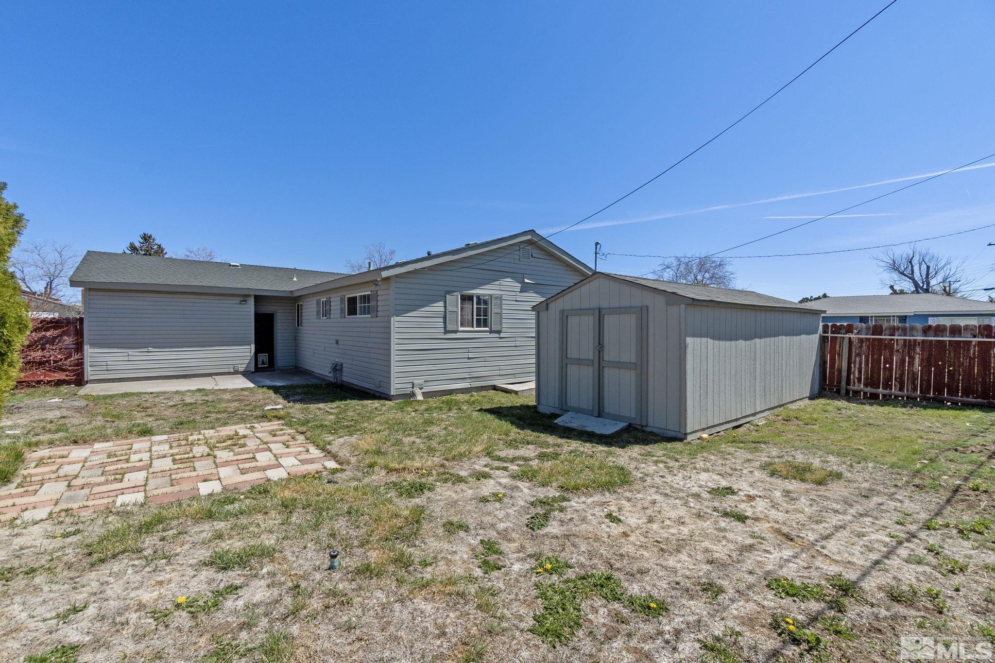 1685 Clemson Road Reno, NV 89502 - Photo 24 of 32 a view of a house with a yard