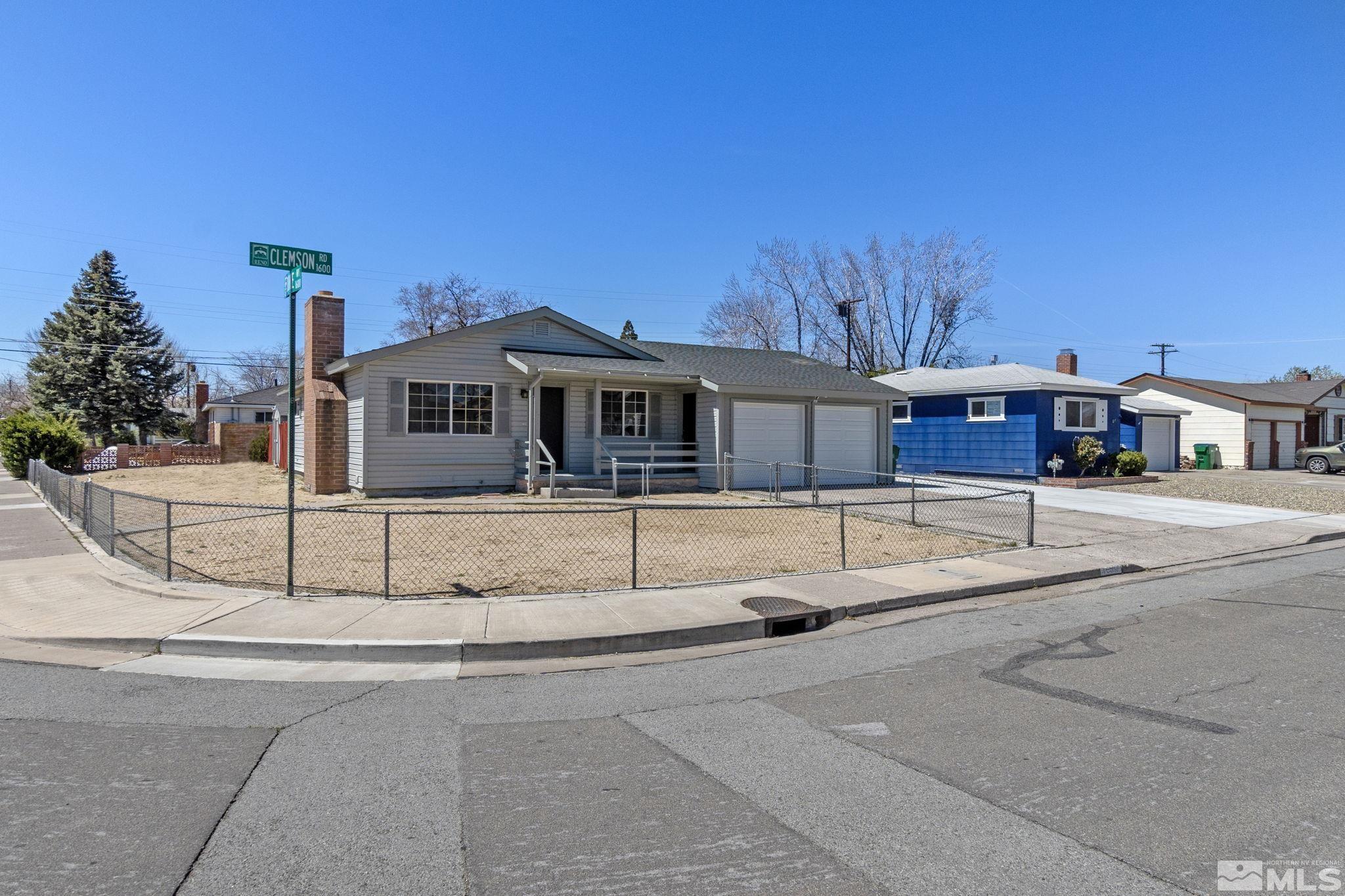 1685 Clemson Road Reno, NV 89502 - Photo 31 of 32 a front view of a house with a porch