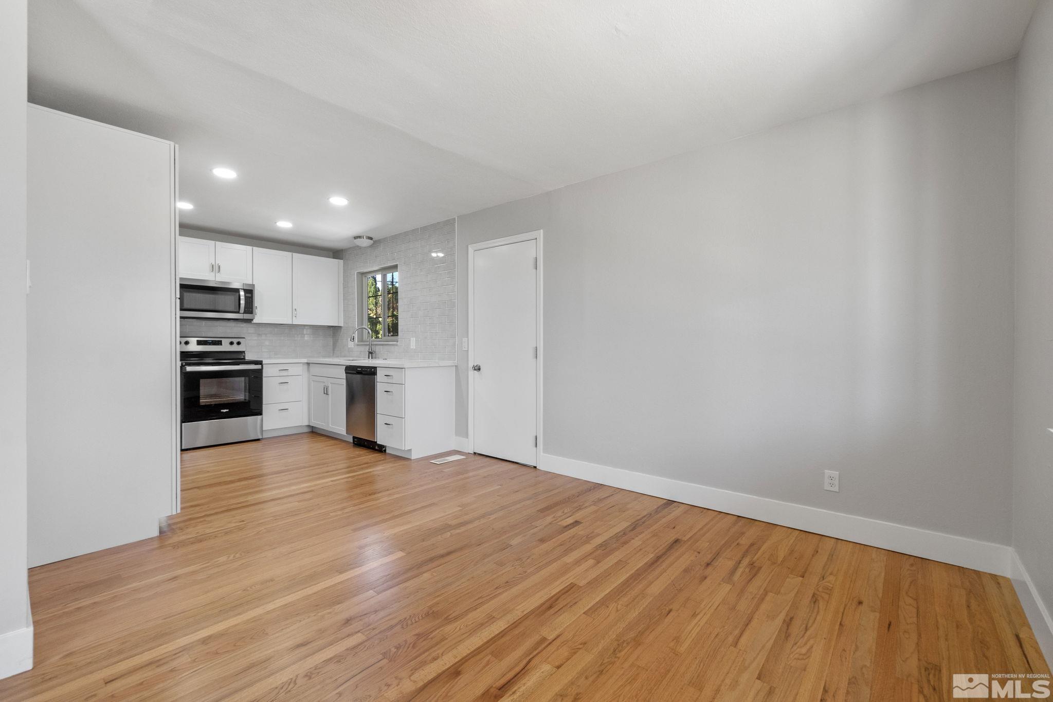 1685 Clemson Road Reno, NV 89502 - Photo 9 of 32 a view of kitchen with wooden floor