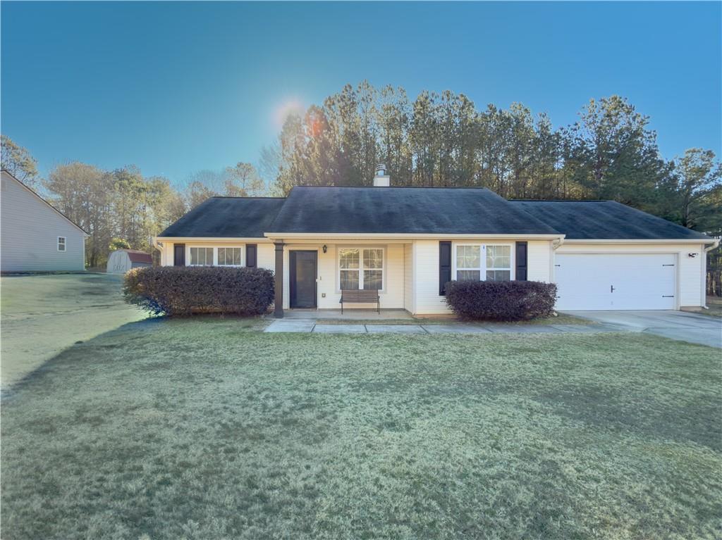 41 Noah's Way Colbert, GA 30628 - Photo 1 of 1 a house view with a garden space