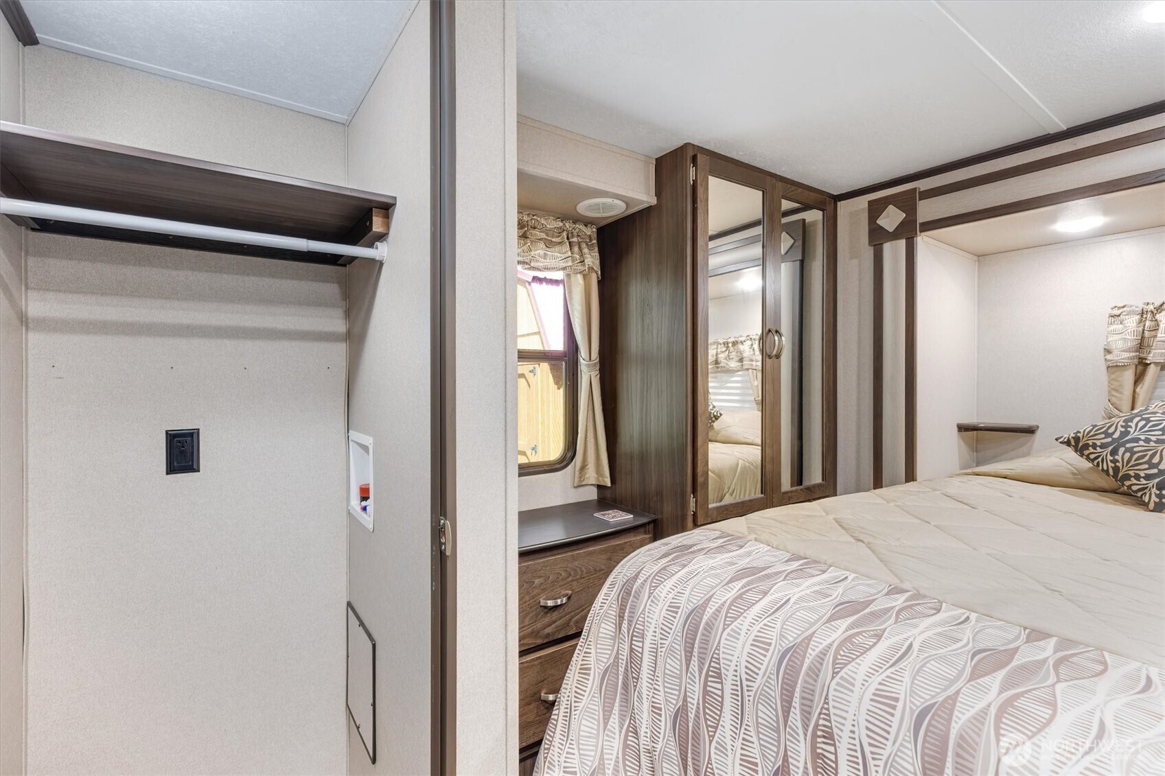 304 Winston Creek Road, Unit B10L3 Mossyrock, WA 98564 - Photo 13 of 30 a bedroom with a bed and a large mirror