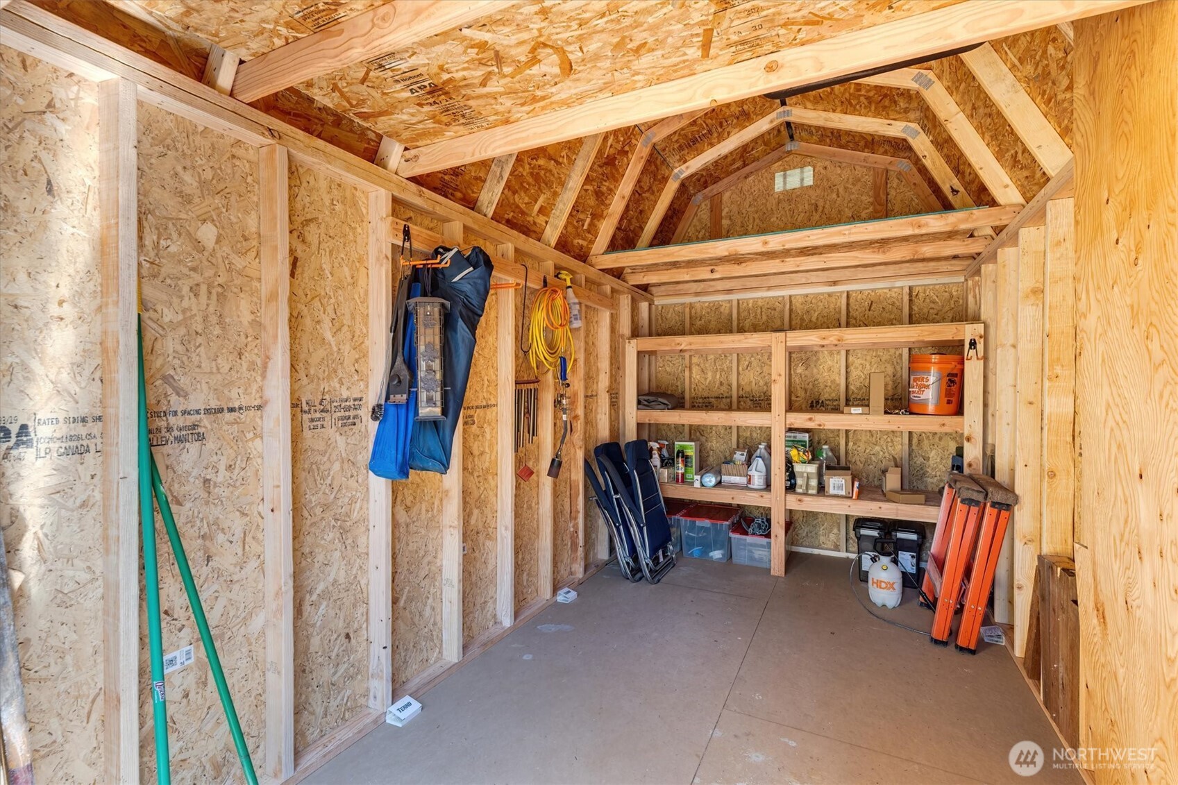 304 Winston Creek Road, Unit B10L3 Mossyrock, WA 98564 - Photo 18 of 30 a view of walk in closet with clothes and shoes