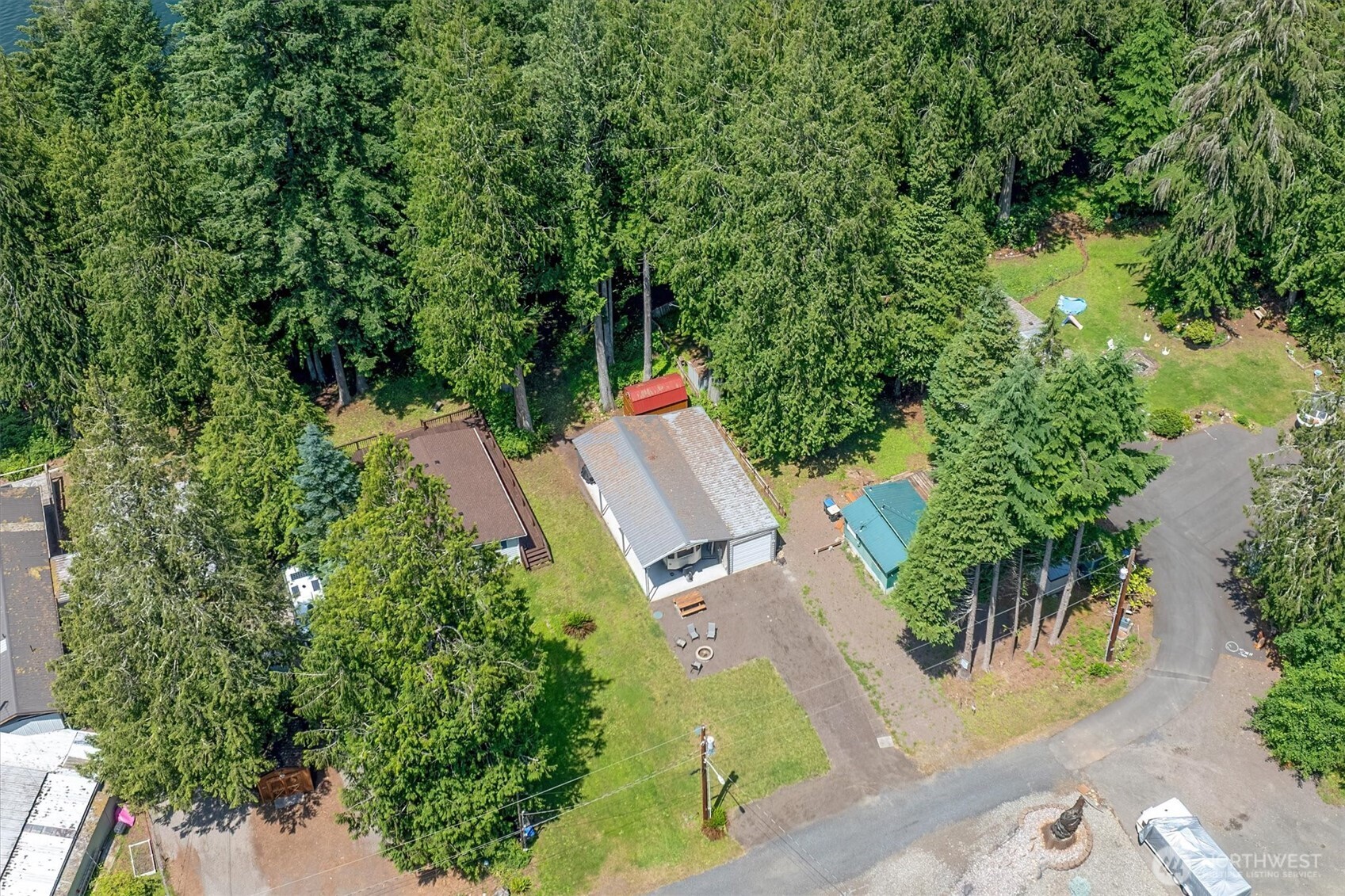 304 Winston Creek Road, Unit B10L3 Mossyrock, WA 98564 - Photo 24 of 30 an aerial view of a house with a yard and swimming pool