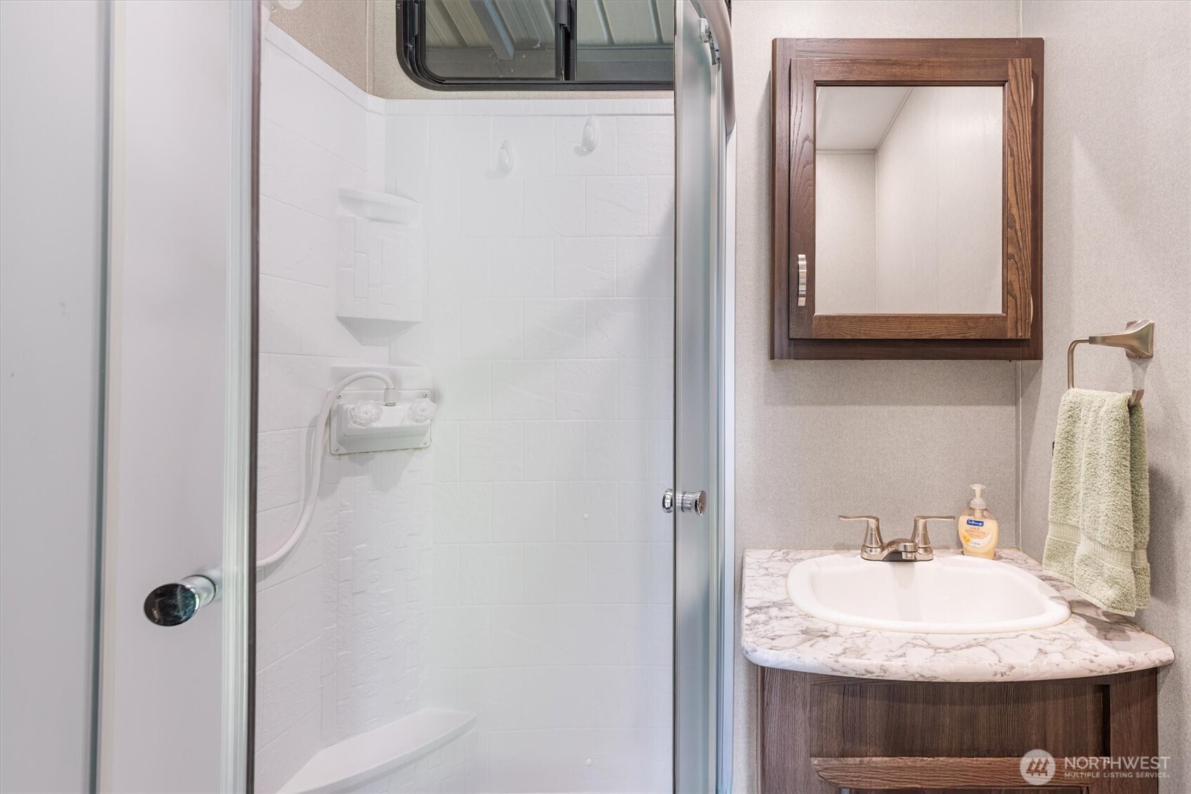 304 Winston Creek Road, Unit B10L3 Mossyrock, WA 98564 - Photo 10 of 30 a bathroom with a sink and a mirror