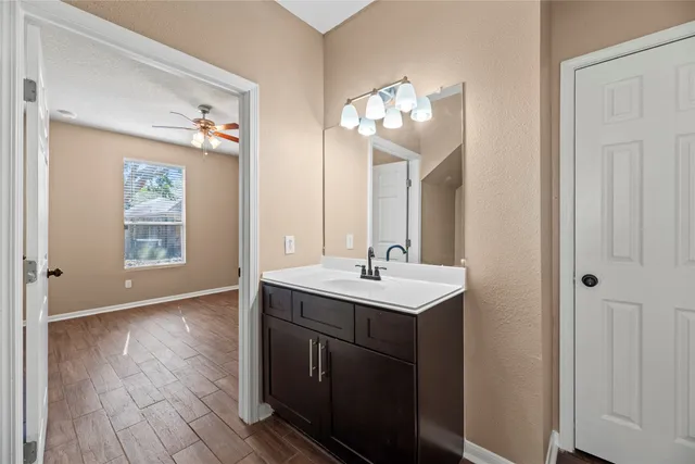 a view of a bathroom sink and mirror