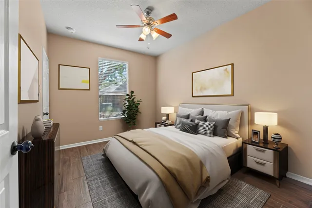 a bedroom with bed and a window