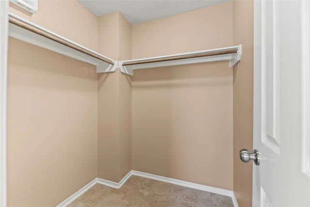 a bathroom with a double vanity sink mirror double and shower