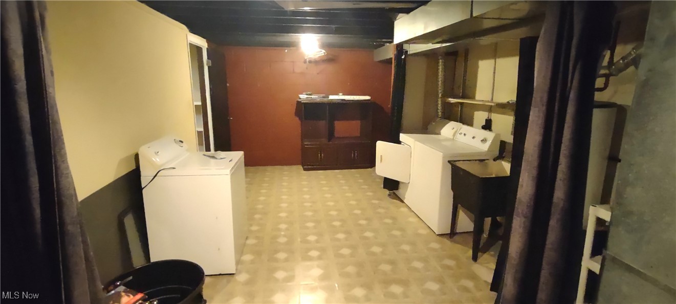 5215 Cline Road Kent, OH 44240 - Photo 19 of 23 LOTS of storage in the basement. Washer & dryer stay with unit