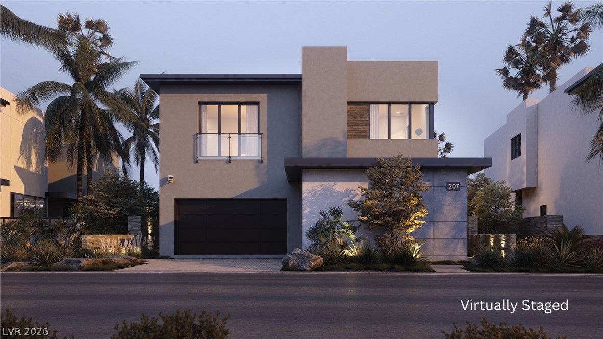 543 Overlook Rim Drive Henderson, NV 89012 - Photo 1 of 19 Modern architecture with clean lines creates an inviting facade.