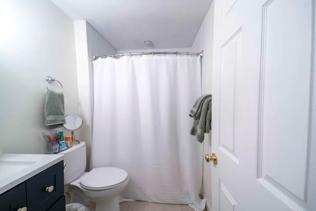 a picture of a book and a white wall