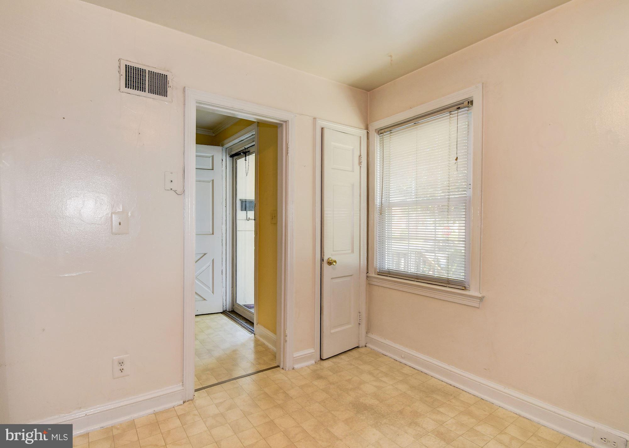 1218 Portner Road Alexandria, VA 22314 - Photo 28 of 31 an empty room with windows and closet