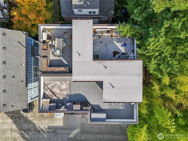 a aerial view of a house with a yard