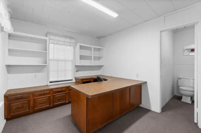 a utility room with washer and dryer