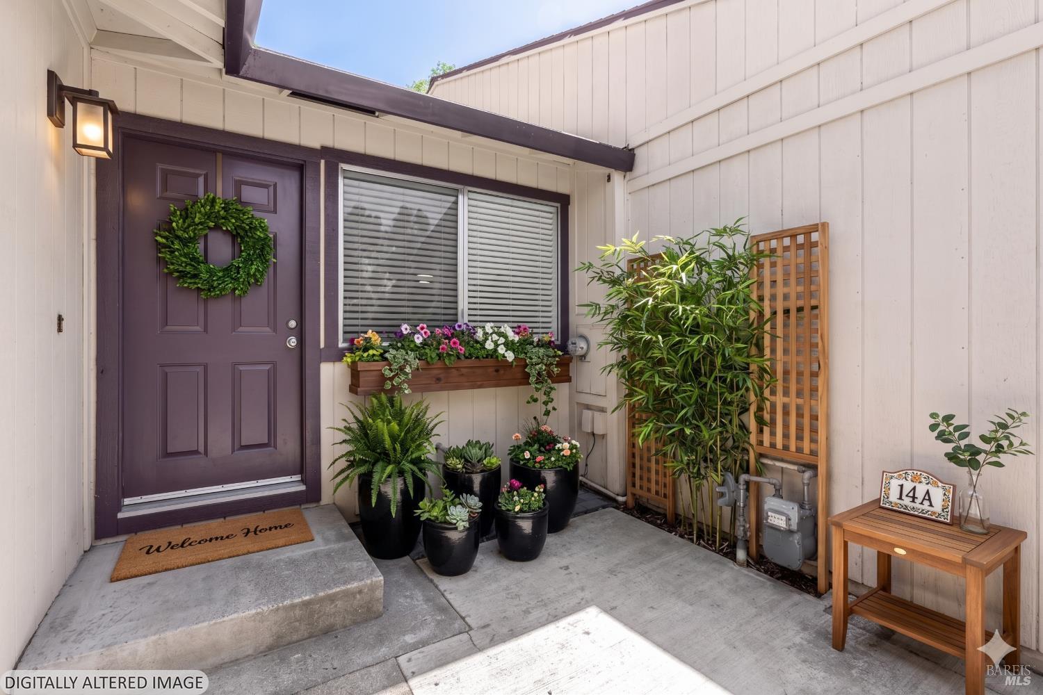 735 Blair Place Santa Rosa, CA 95401 - Photo 5 of 16 a potted plant sitting in front of a house