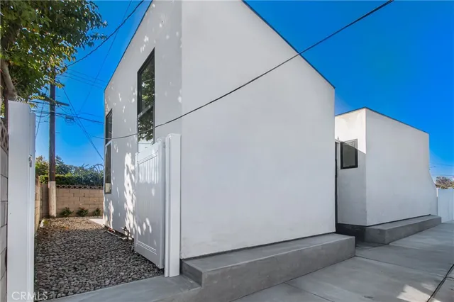 a kitchen with sink and stove