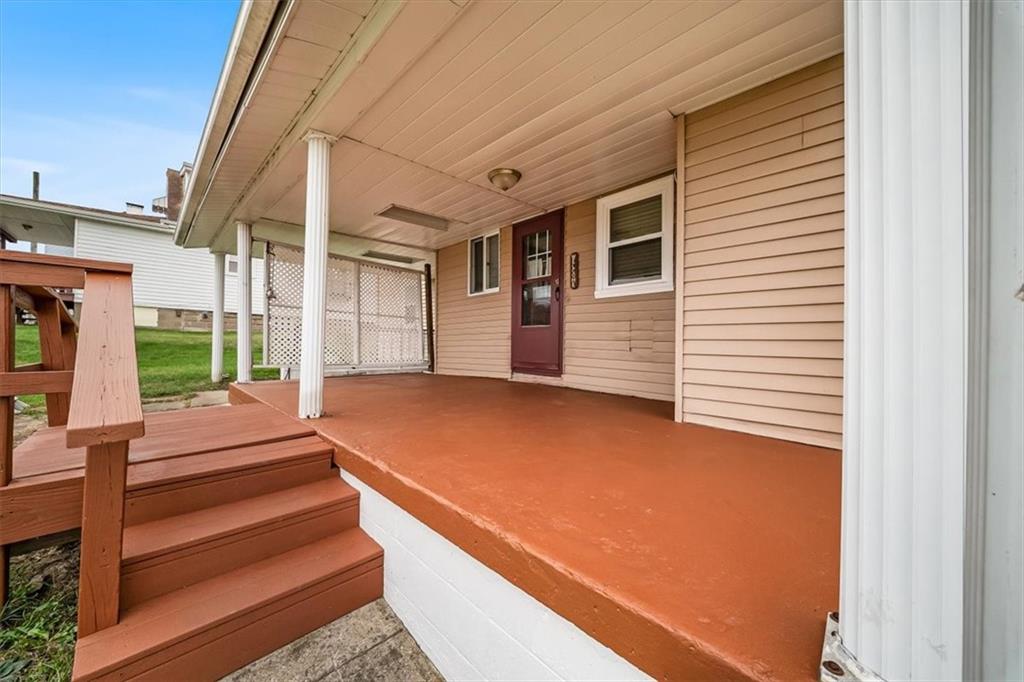2164 Brodhead Road Aliquippa, PA 15001 - Photo 7 of 28 a view of a house with a backyard