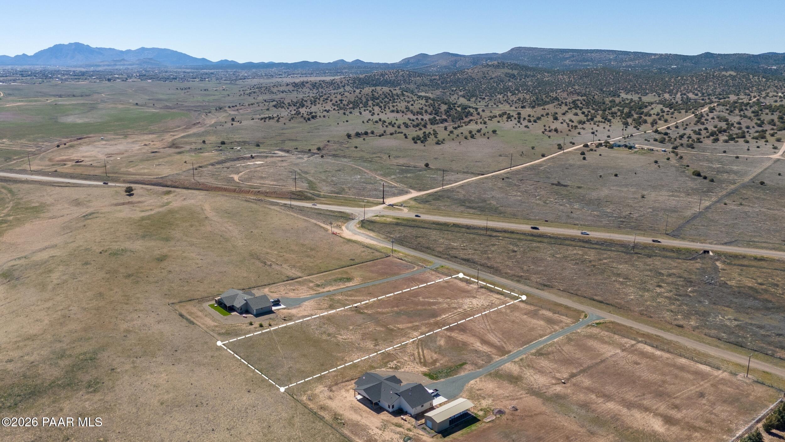 20047 Old State Rte 89 Paulden, AZ 86334 - Photo 11 of 12 a view of a backyard with a mountain