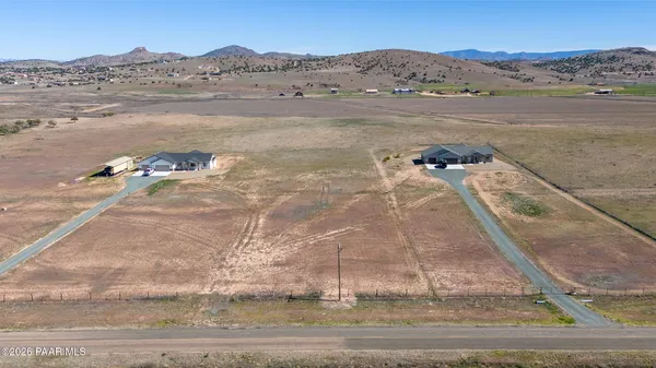 a view of a backyard with a mountain