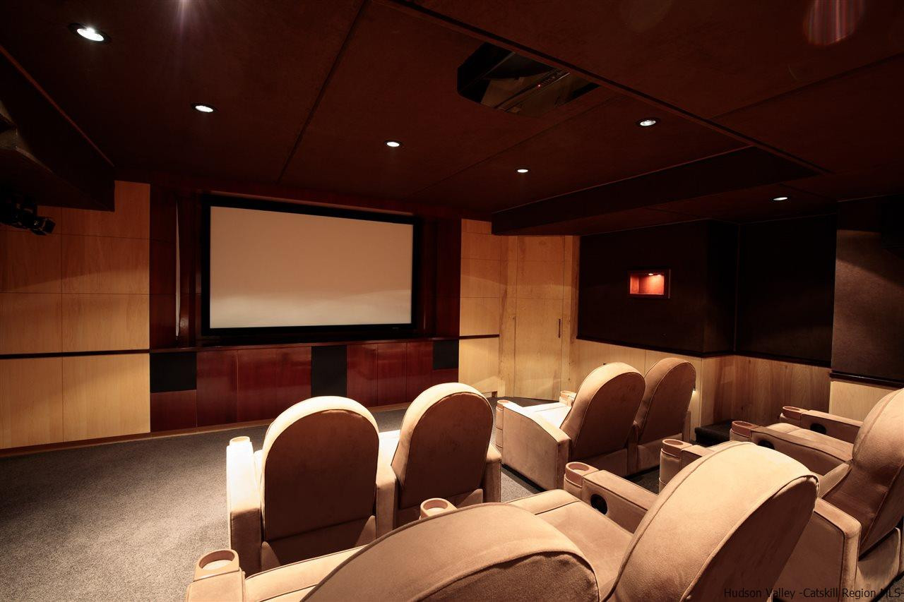 4644 Atwood Road Stone Ridge, NY 12484 - Photo 17 of 26 a group of chairs sitting next to a projector screen
