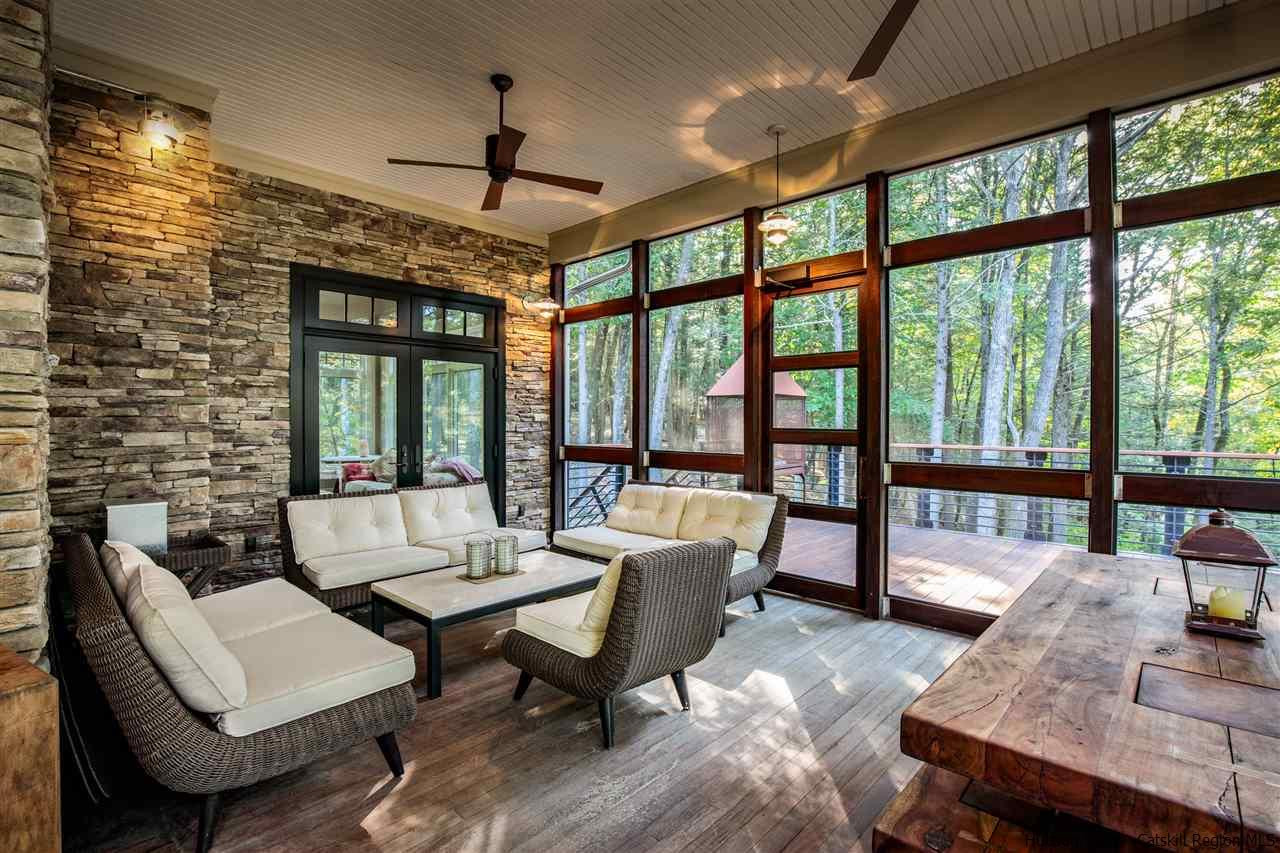 4644 Atwood Road Stone Ridge, NY 12484 - Photo 19 of 26 a living room with furniture and a large window