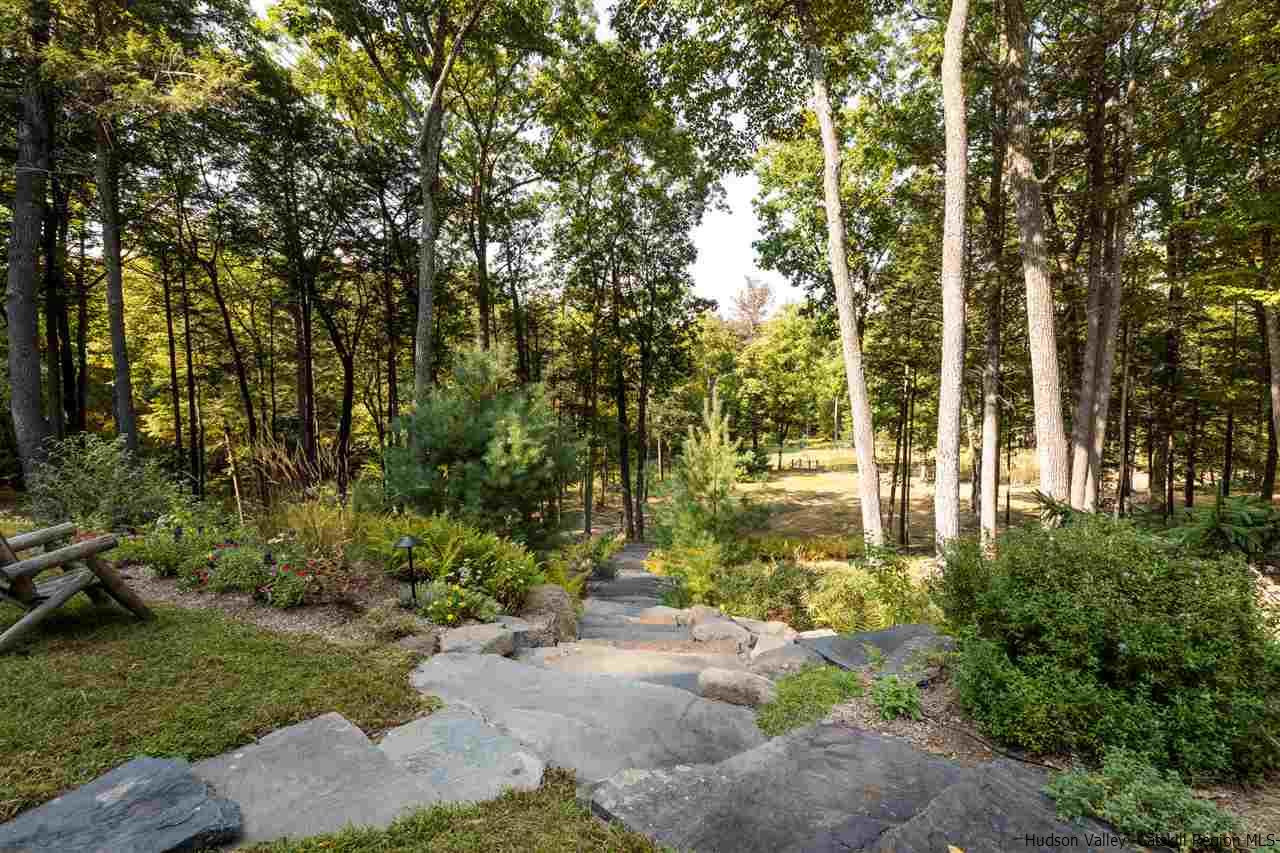 4644 Atwood Road Stone Ridge, NY 12484 - Photo 23 of 26 a backyard of a house with lots of green space