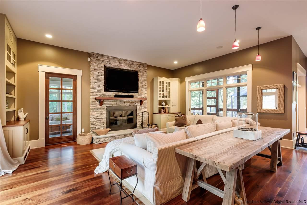 4644 Atwood Road Stone Ridge, NY 12484 - Photo 10 of 26 a view of a dining room with furniture window and wooden floor