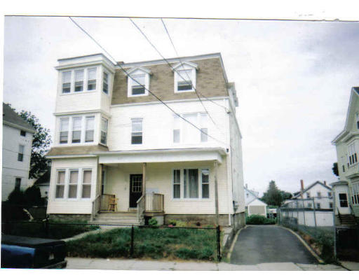 697 Second Street Fall River, MA 02721 - Photo 1 of 1 a front view of a house with a yard