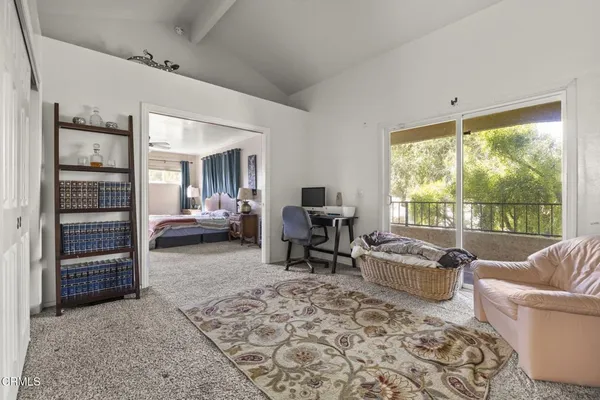 a bedroom with a bed and furniture