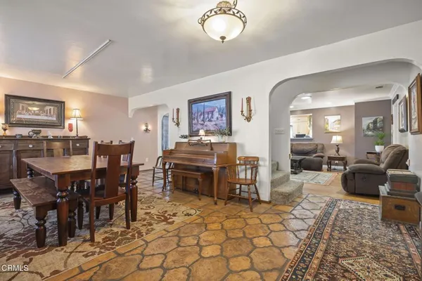 a view of a dining room with furniture