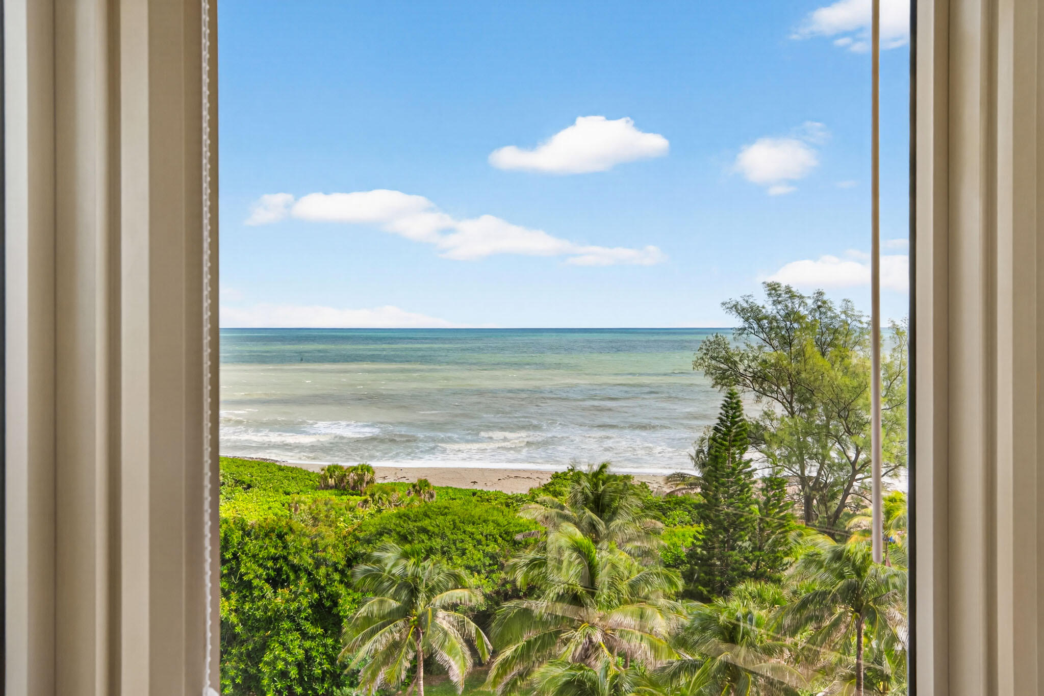 3920 North Ocean Drive, Unit 7A Singer Island, FL 33404 - Photo 14 of 35 a view of a lake from a window