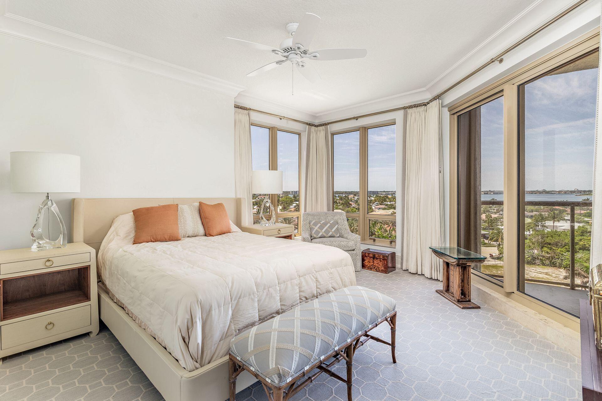 3920 North Ocean Drive, Unit 7A Singer Island, FL 33404 - Photo 20 of 35 a large bedroom with a bed and large window