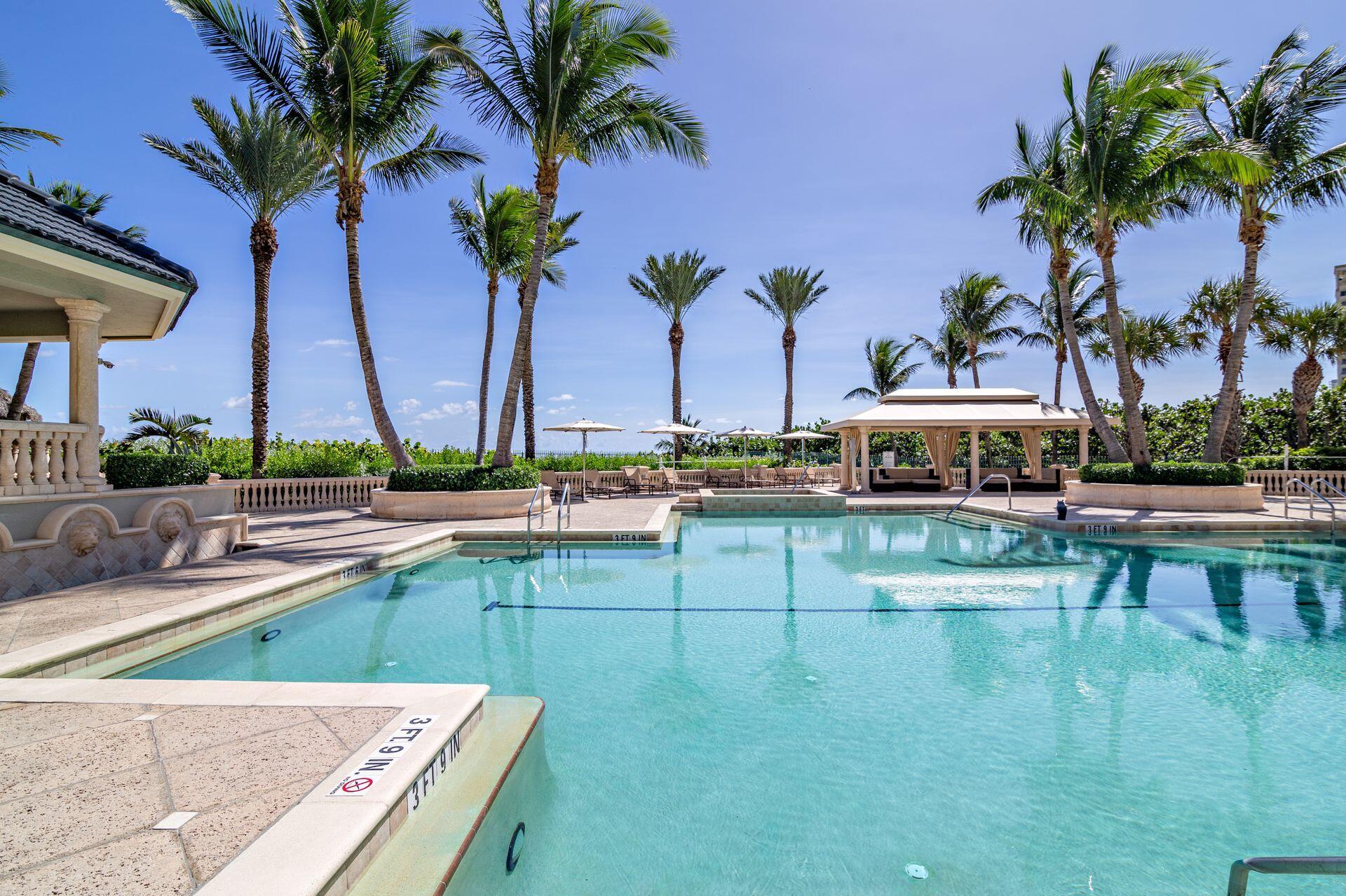 3920 North Ocean Drive, Unit 7A Singer Island, FL 33404 - Photo 24 of 35 a view of swimming pool with outdoor seating and a patio